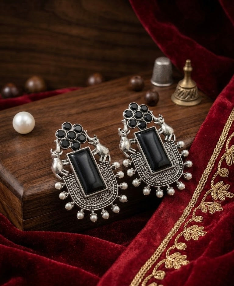 Black German Silver Elephant Touch Earrings