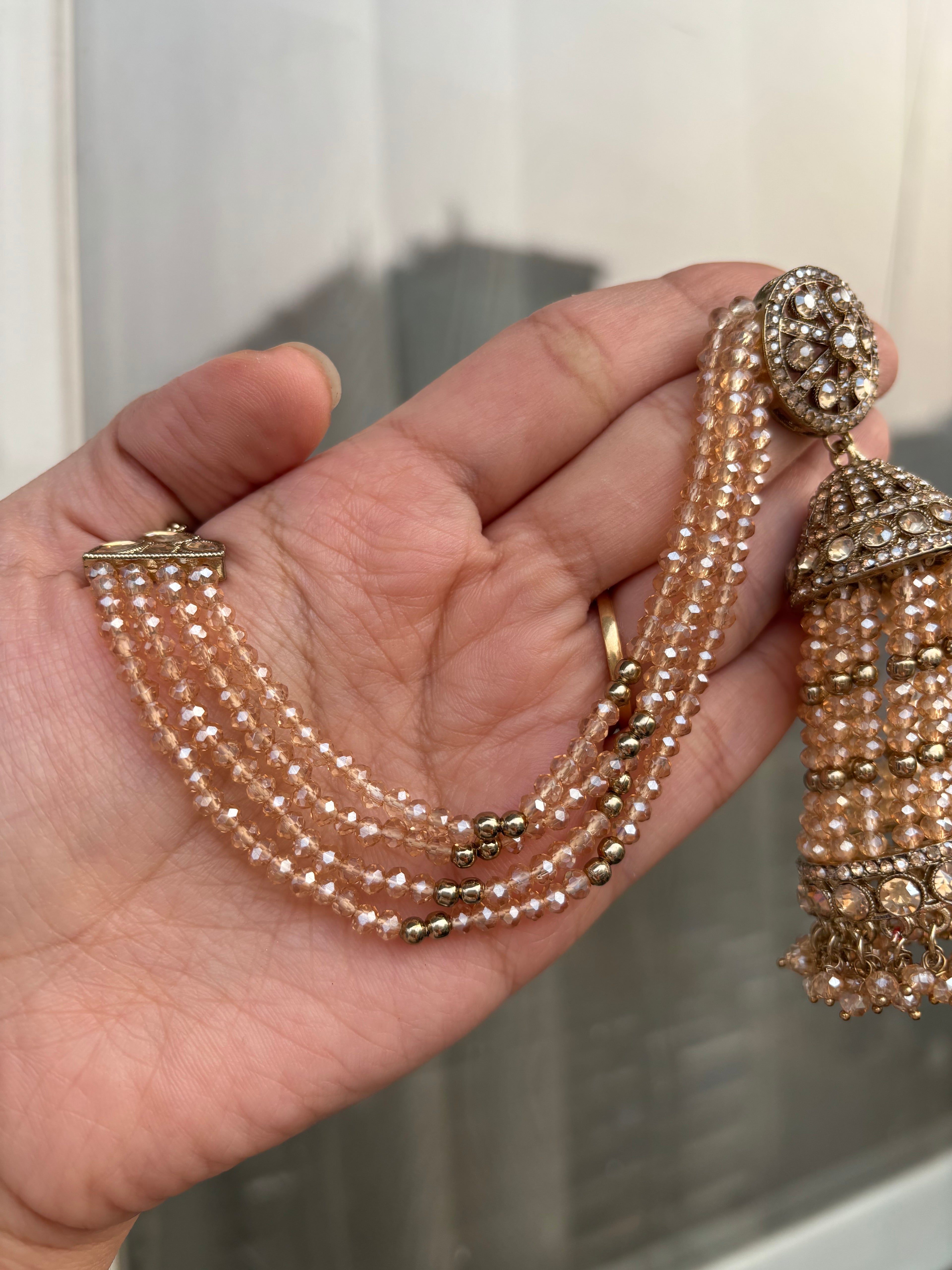 High Quality Designer Crystal Beads Work Champagne Colour Long Jhumkas With Side Layers