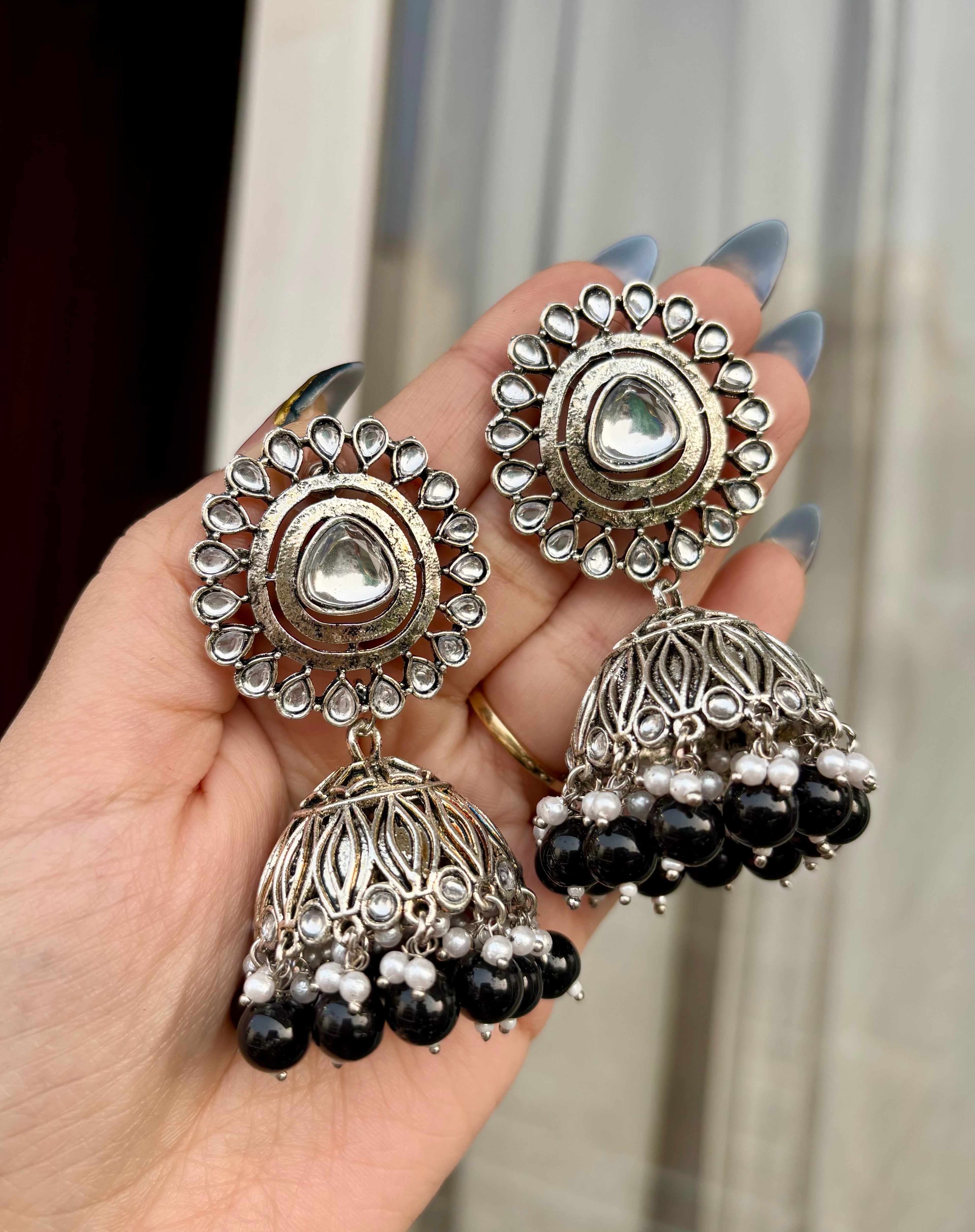 Black Flower Silver Jhumkas