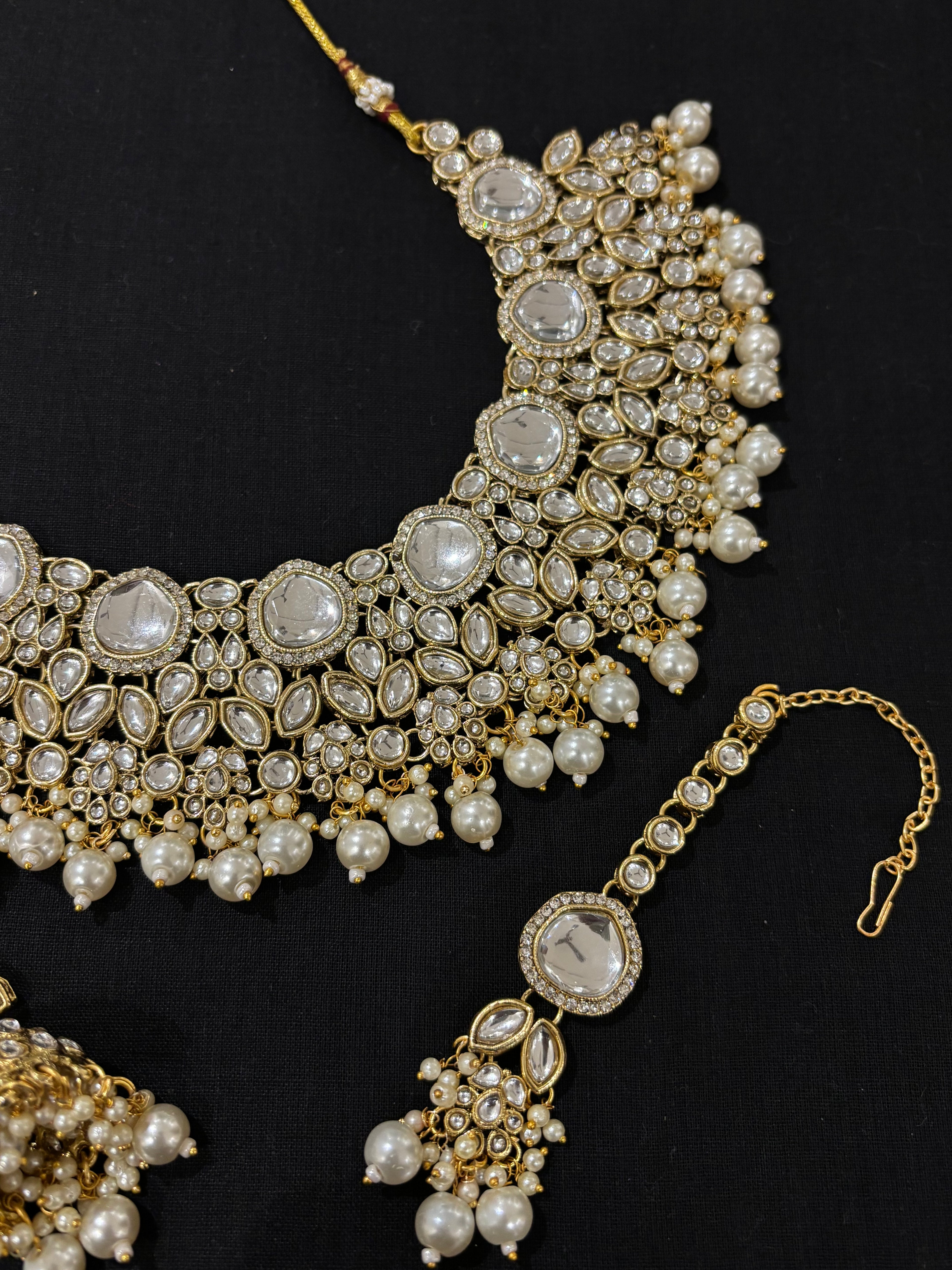 Aman Kundan Heavy Look Necklace With Mang Tikka & Jhumkas ( White Pearls )