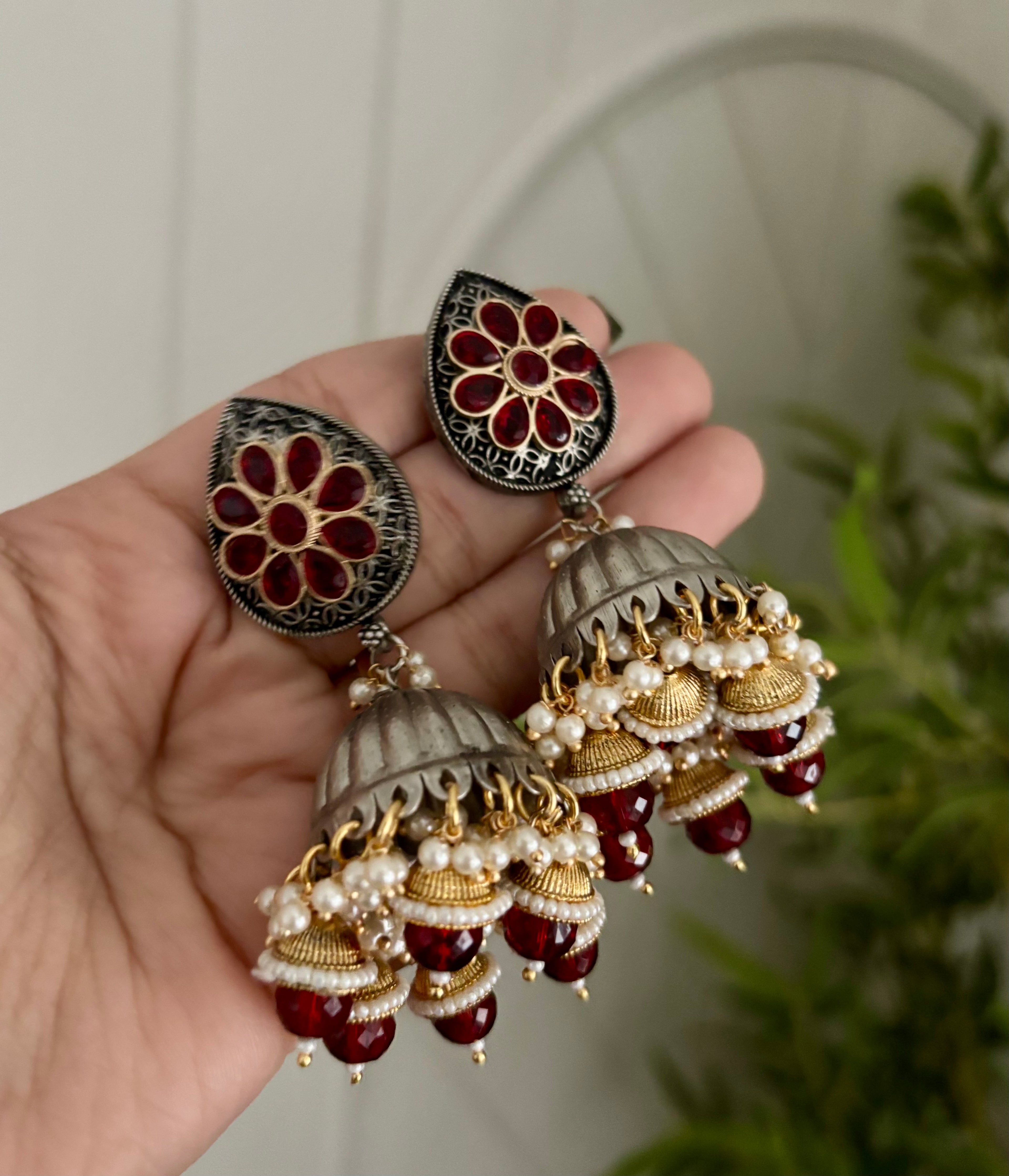 Silver & Golden Touch Jhumkas In Maroon Shade